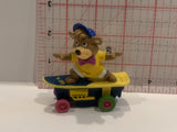 BooBoo Bear Riding a Skateboard Action Figure Toy