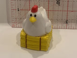 Chicken Hen Sitting on Straw Figurine Toy