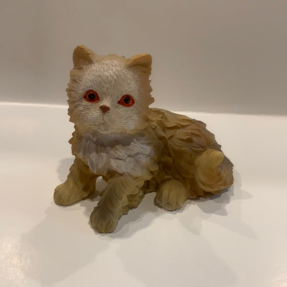 Brown tan long hair cat sitting figurine